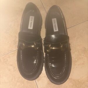 Steve Madden Glossy Black Loafers with Gold Accent